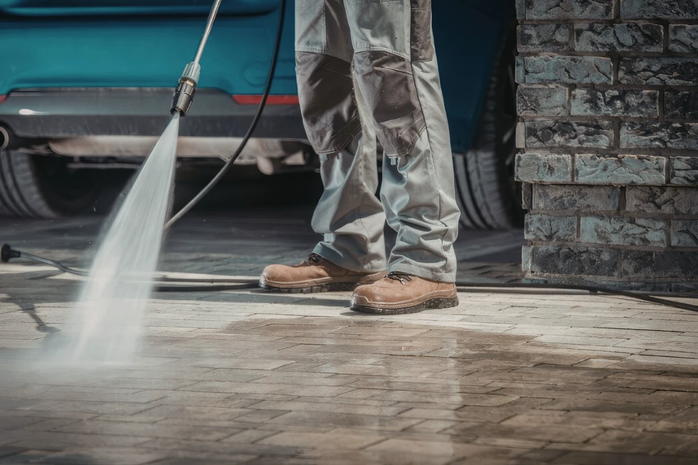 Gentle but effective pressure cleaning on an exposed aggregate driveway in North Brisbane.