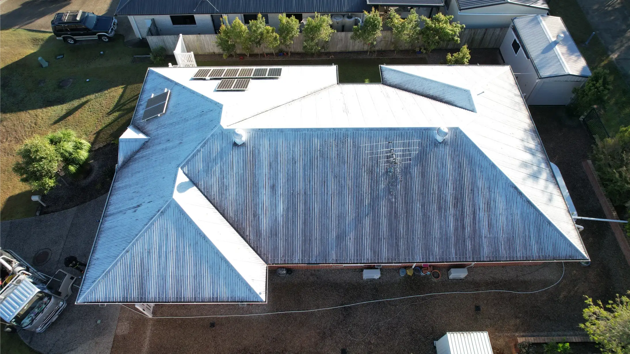 Professional roof painting service in Brisbane restoring residential roof